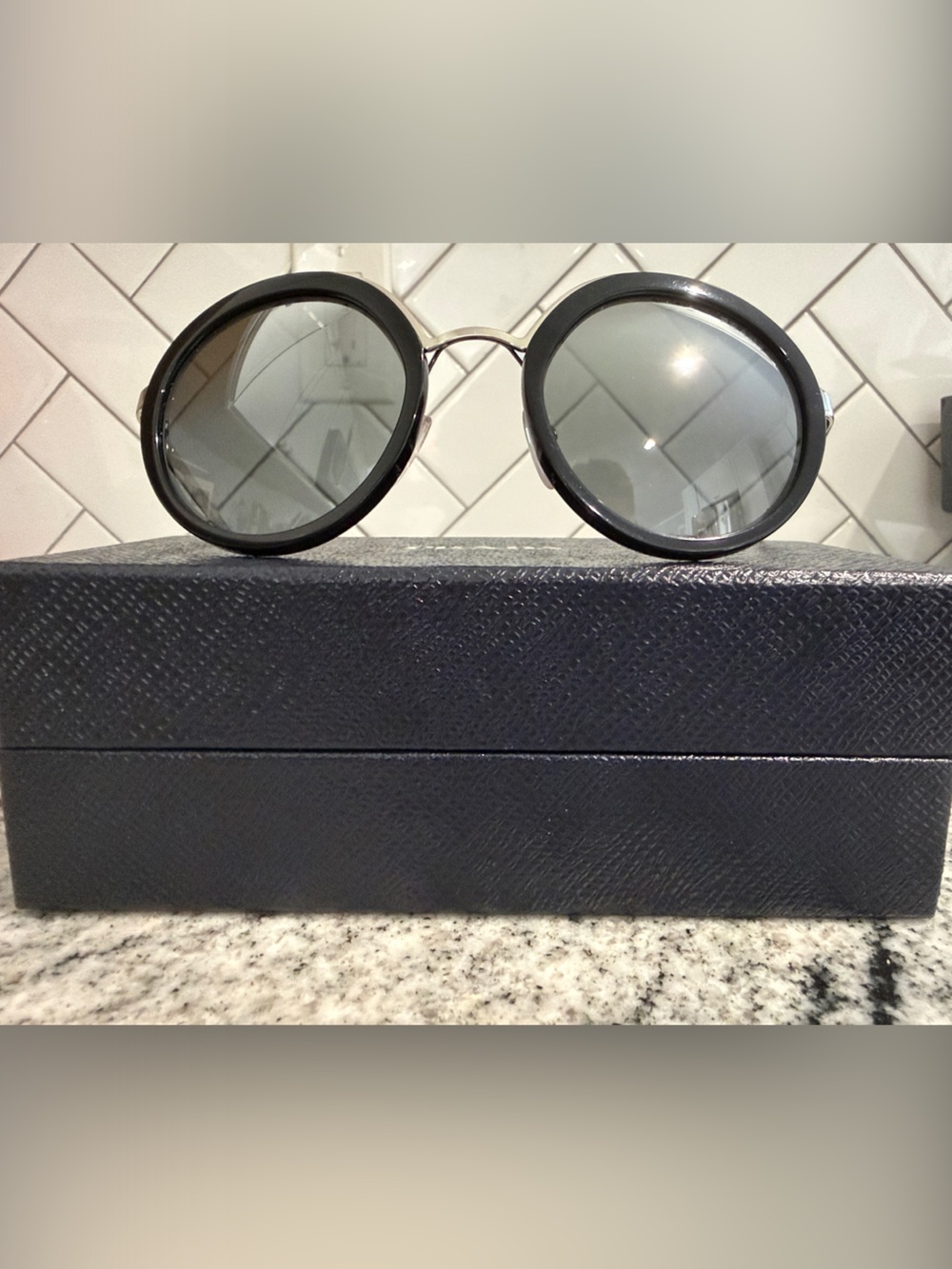 Prada Round Black Sunglasses with Mirror Lenses